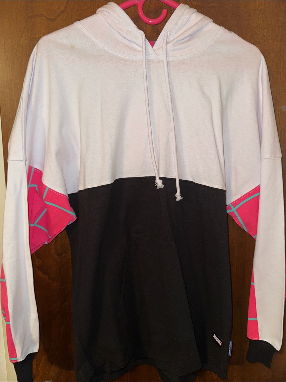 Marvel x Disney official Women's Ghost Spider Hoodie with front pocket.